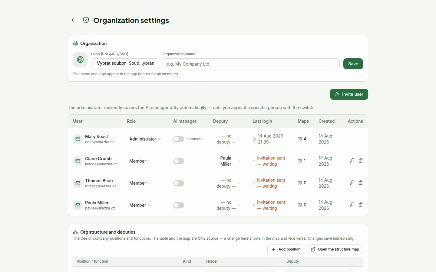 Organization settings: name and logo, AI settings, the instance default skin and the user table with roles